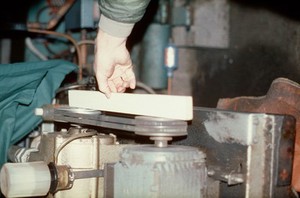 view Pulleys of electric motor and milking pump