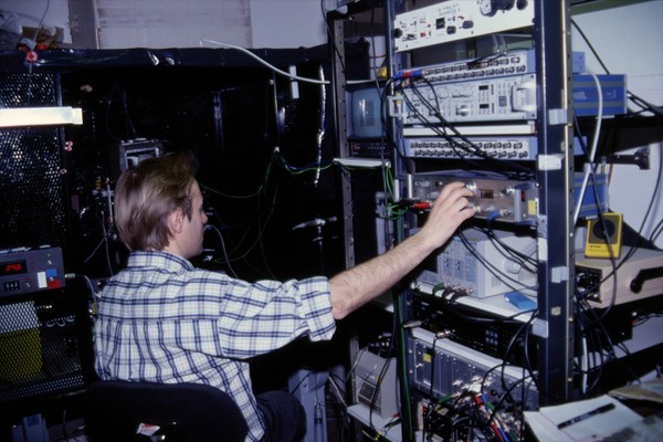 Researcher using patch clamping apparatus for ion