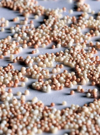 Spheres of medicine to be delivered in capsule form