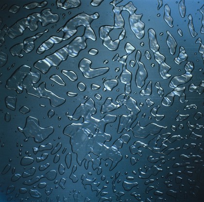 Droplets showing surface tension