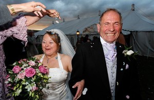 view Bride and groom on their wedding day, Down’s syndrome