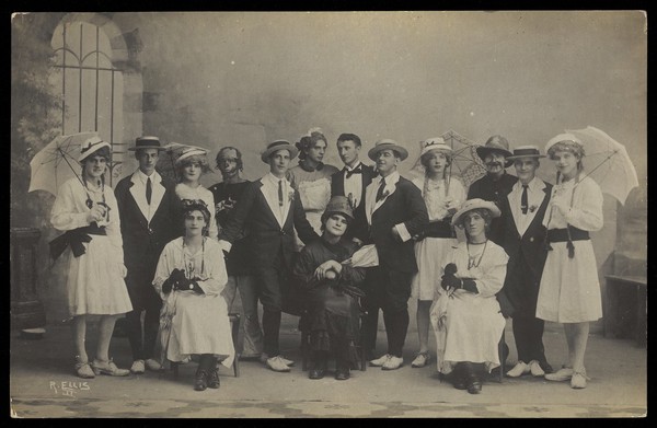 Servicemen in Malta performing a play, some in drag. Photographic postcard by R. Ellis, ca. 1918.