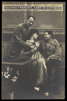 French prisoners of war performing a show at a prisoner of war camp in Cottbus. Photographic postcard by P. Tharan, 191-.