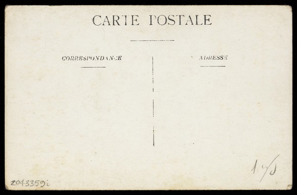 Two soldiers playing in a military concert party embrace: one is in drag and the other is wearing a kilt. Photographic postcard, 191-.