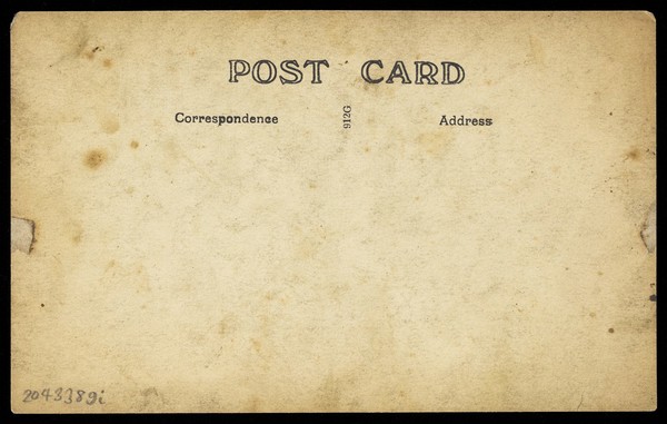 Three sailors, two in drag wearing pierrette costumes, pose on deck. Photographic postcard, 191-.