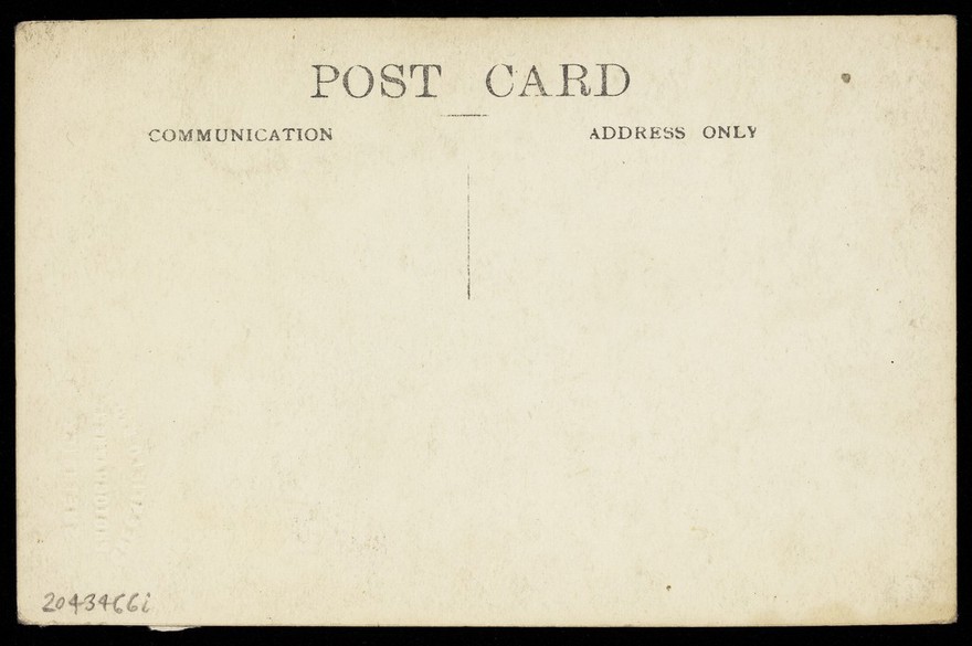 Roy and Gus, two music-hall actors, one in drag, converse across a bench. Photographic postcard by Greenfield Bros, 192-.