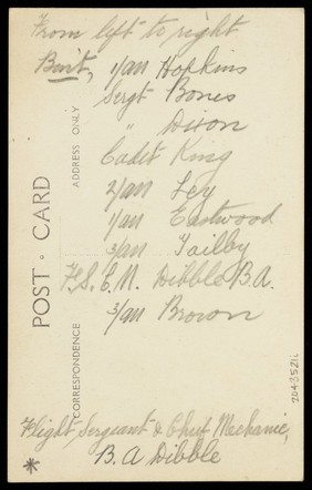 Actors, one in drag, performing on stage as "The Curios". Photographic postcard, ca. 1918-1920.