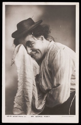 George Robey in drag as a pantomime dame.