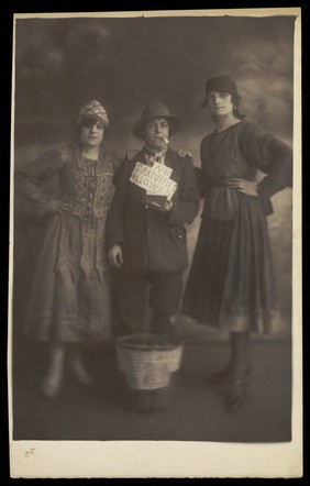 Three actors in drag, posing in theatrical costumes.