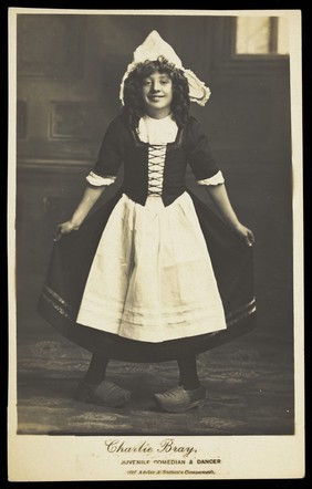 Charlie Bray in character as a Dutch girl. Photographic postcard, 191-.