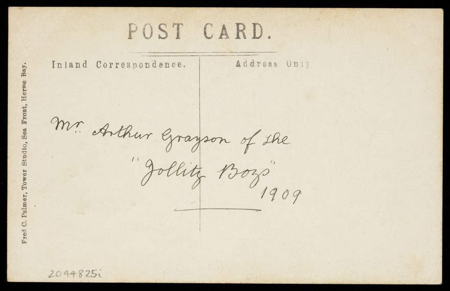 Arthur Grayson, dressed as a bride, for "The Jollity Boys". Photographic postcard, 1909.