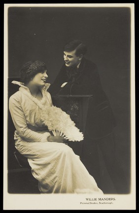 Willie Manders in drag and in men's attire. Photographic postcard, 1914.