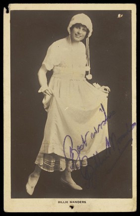 Billie Manders in drag. Photographic postcard, ca. 1920.