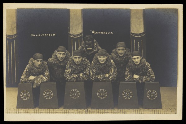 Billie Manders and members of the Quaintesques. Photographic postcard, 192-.