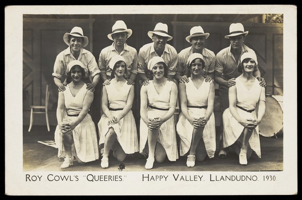 Members of Roy Cowl's "Queeries" pose for a group portrait in Llandudno. Photographic postcard, 1930.