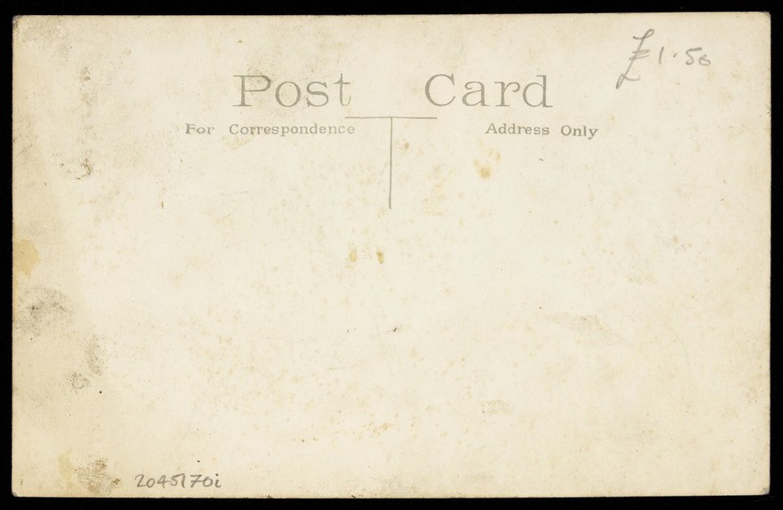 Bartlett and Ross in drag pose in profile, with matching hair and make-up. Photographic postcard, 1937/1938.