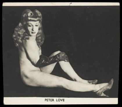 Peter Love posing nude in drag.