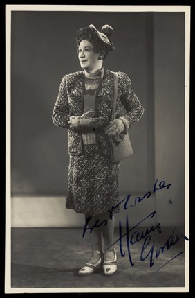 Harry Gordon performing in drag. Photographic postcard, 194-.