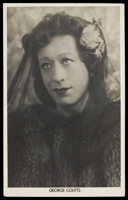 George Coutts in drag. Photographic postcard, 194-.