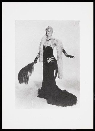 Douglas Byng in drag as a glamorous woman. Photograph, 194-.