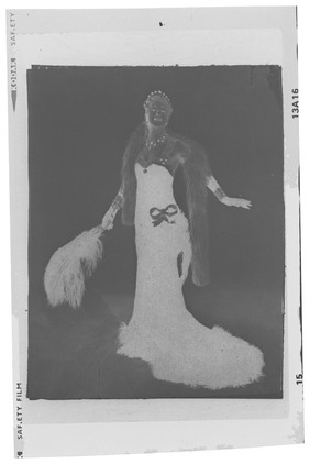 Douglas Byng in drag as a glamorous woman. Photograph, 194-.