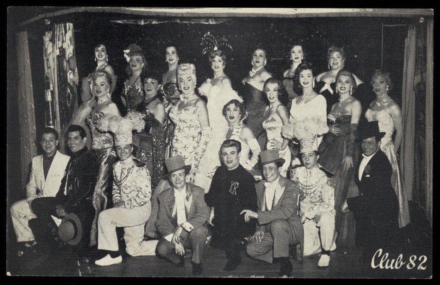A large group of men in drag at Club 82, New York City. Process print, 196-.