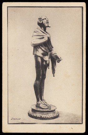 A bronze statue of a man holding a robe over his naked body. Process print, 193-.