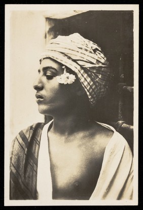 Photograph of an Arab boy in profile, North Africa.