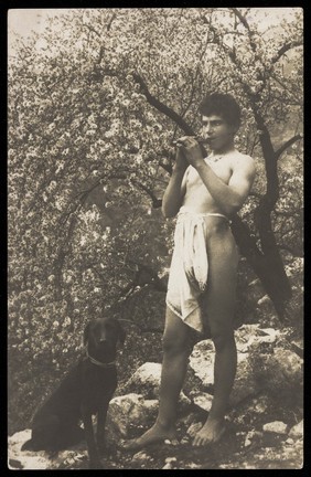 A Sicilian young man playing the flute. Photographic postcard, 190-.