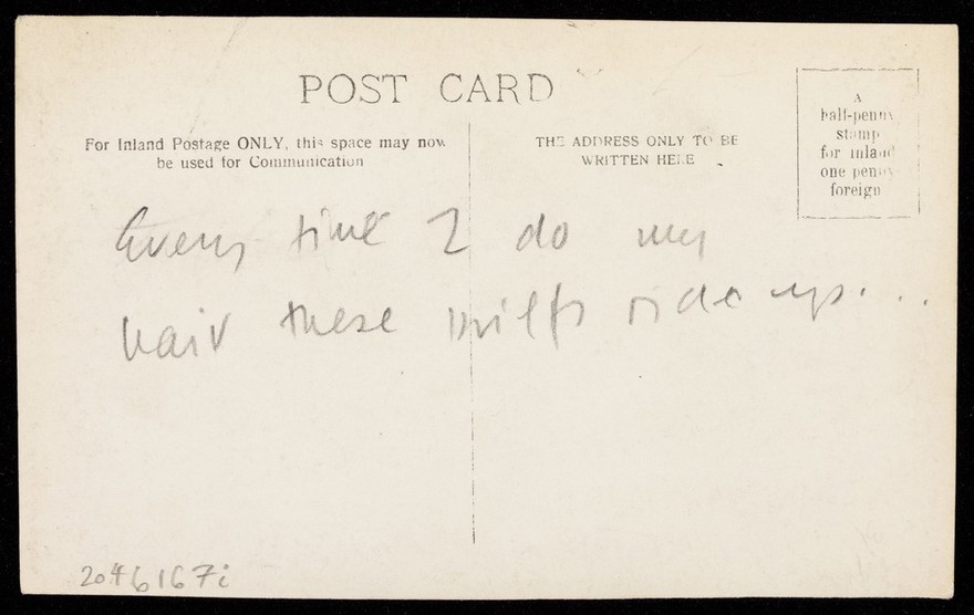An athletic man poses with his back to the viewer. Photographic postcard, 193-.