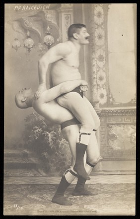 Two of the Raicevich brothers, wrestlers. Photographic postcard, 19--.