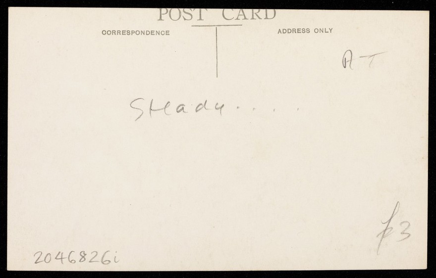 Laurence Woodford in a start pose for running a race. Photographic postcard, 19--.