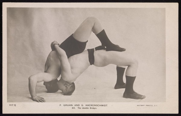 Ferdinand Gruhn and George Hackenschmidt performing a wrestling move. Process print, 19--.