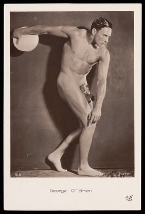 George O'Brien posing as the Discobolus. Photographic postcard, 192-.