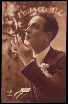 A man saying through the smoke of his cigarette "I love you". Photographic postcard, 192- (?).