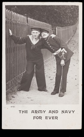 Two men pose as a sailor and a soldier. Photographic postcard, ca. 1905.