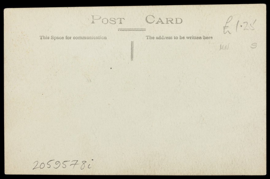 Two soldiers stand together for a portrait. Photographic postcard by W.H. warren, 191-.