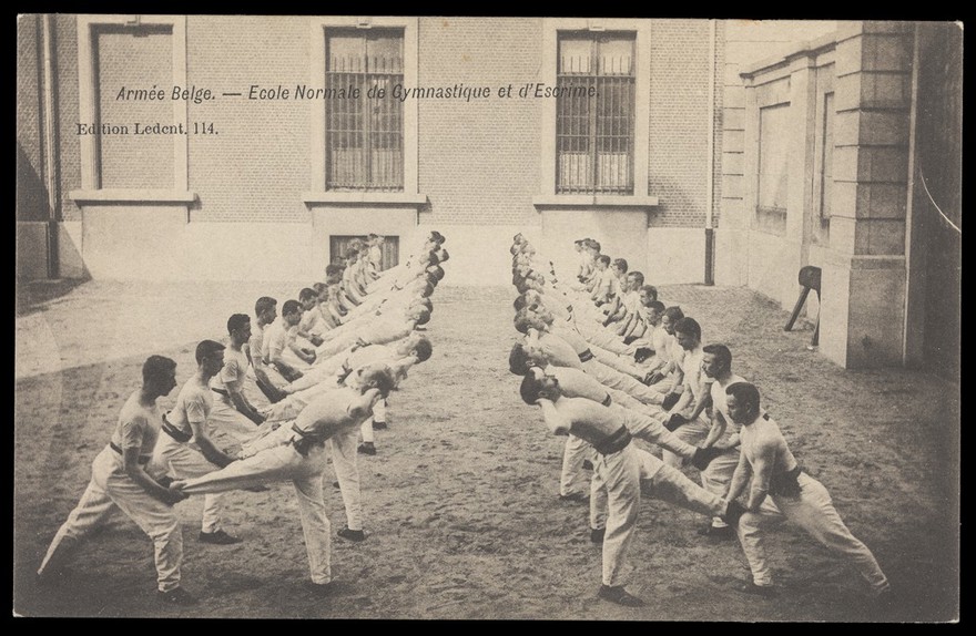 Ecole Normale de Gymnastique et d'Escrime, Joinville, Val-de-Marne: Belgian soldiers performing gymnastic exercises. Process print, 190-.