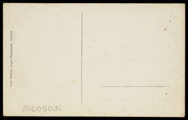 Actors performing French theatre at a prisoner of war camp in Cottbus. Photographic postcard, 191-.