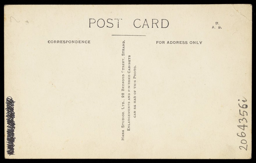 An actor in pantomime drag. Photographic postcard by Hana Studios, 190-.