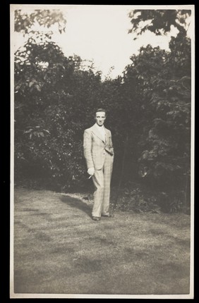 A young Belgian cavalry officer holding a baton and gloves. Photographic postcard by R. Moraux, 191-.