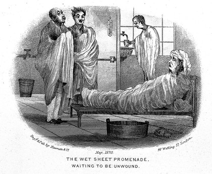 A man visiting a health resort is covered with a sheet and lying on a wooden daybed, two men covered with sheets are standing before him; in the background a man with a sheet on his shoulders is filling up a glass with water. Etching, May 1870.