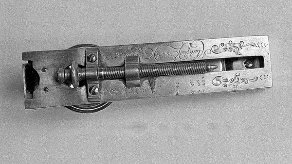 Inscription and numbering on a John Clark microscope.