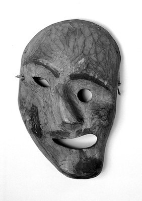 Carved and painted wooden mask.