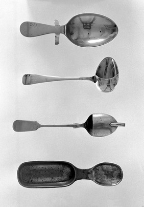 4 Pewter medicine spoons or measures. Medicine spoon or measure, probably pewter, with bowl at either end. Medicine spoon or child's feeding spoon, plated. Hallmark castle in shiled; EP; Co. P; S. Medicine spoon or measure, plted. Hall-mark: Maws's trademark; A; 16 in shield. Veterinary feeding spoon. Hallmark: ETM; fleur-de-lys; C in oval, NS.