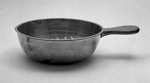 view Pewter bleeding bowl, flat handle.