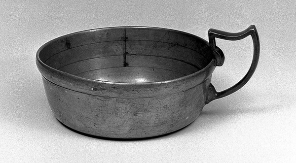 Pewter bleeding bowl, loop handle, 17th to 18th century.