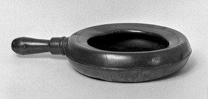 view Bedpan with screw handle. Loddon mark of crown and Tudor rose.