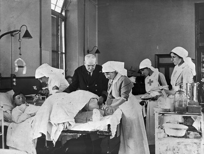 World War I: doctor and nurse treating a wounded soldier