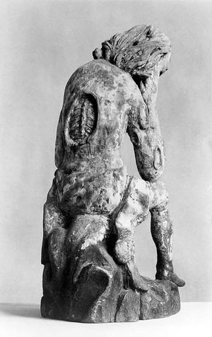 view Back of Job statue, showing syphilis ulcers.